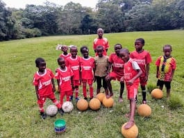 Football player controlling the ball with confidence
