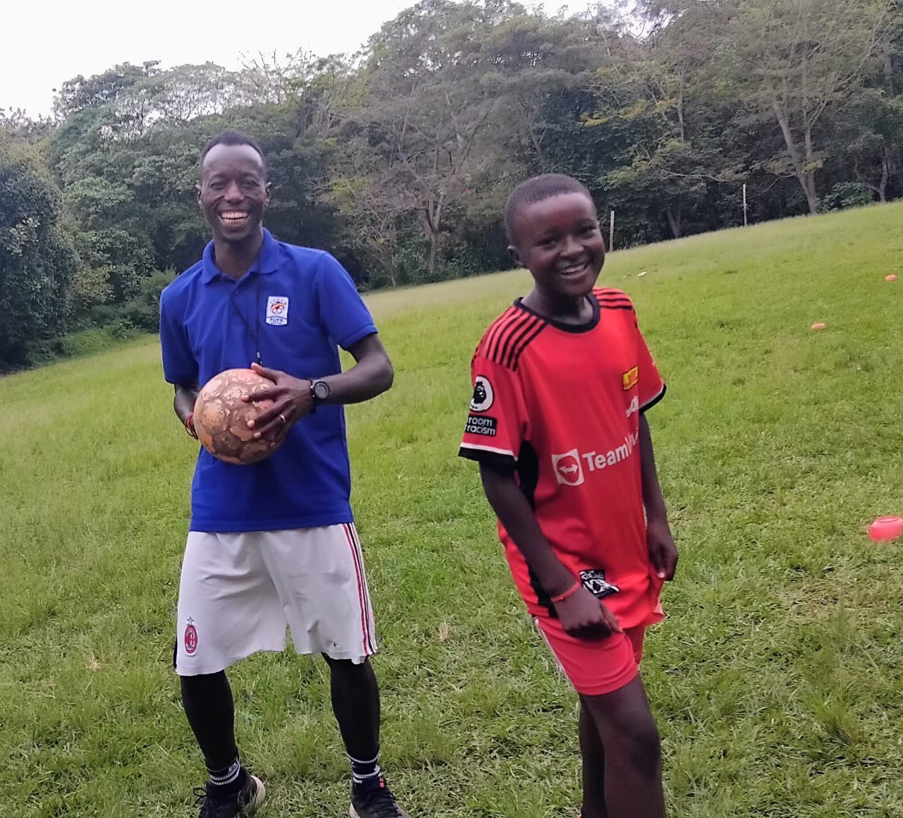 Football setup representing structured training environments
